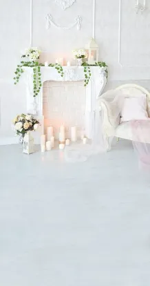 White fireplace and candles