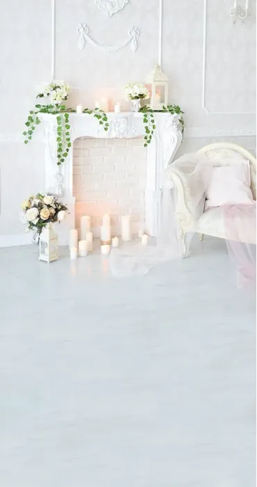 White fireplace and candles