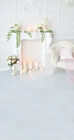White fireplace and candles